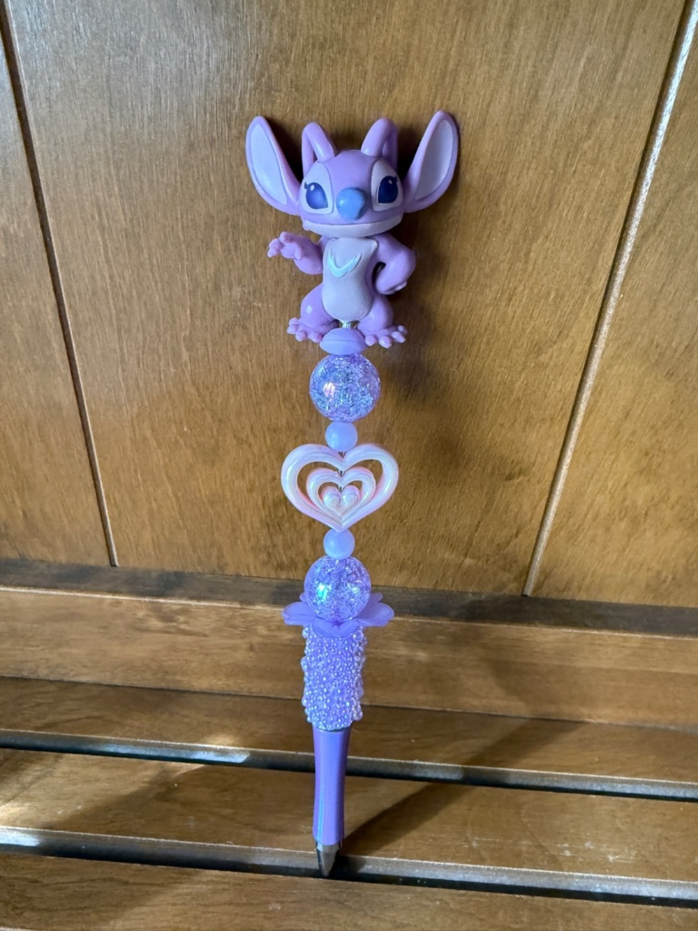Handcrafted lavender Angel Bead Decorative Pen with Heart Charm